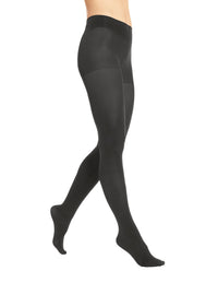Black full-length tights shown on a cropped human model from the waist down in side profile against a plain white background.